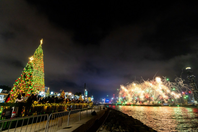 Savor the magic of Christmas Town and the breathtaking “Winter Harbourfront Pyrotechnics” show in the West Kowloon Cultural District. (Credit: Hong Kong Tourism Board)